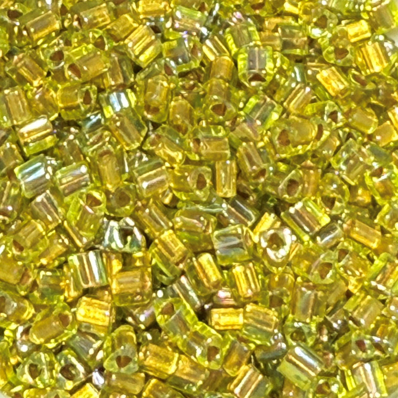 TOHO TG-11-996 2 mm 11/0 Gold Lined Rainbow Yellow Glass Triangle Beads - 5 gm