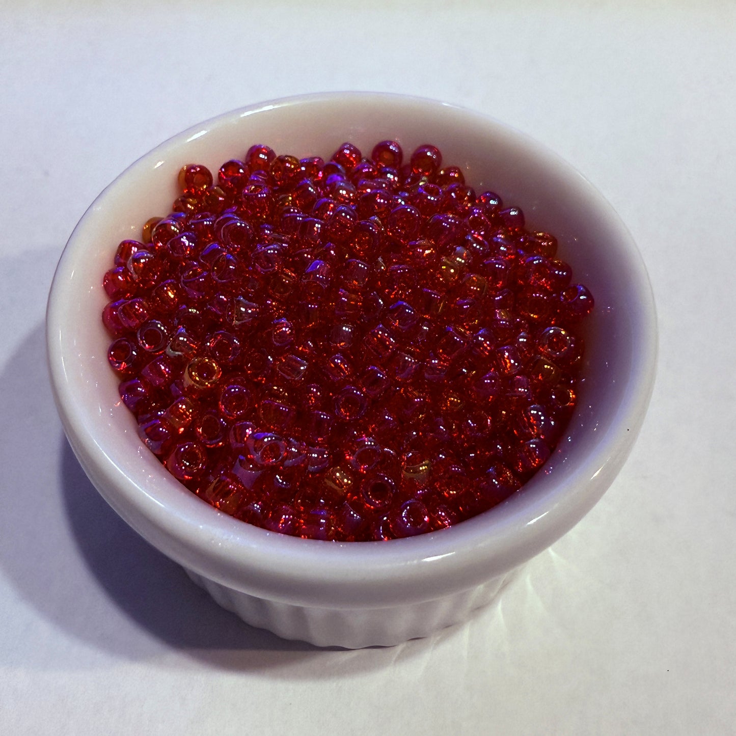 Dyna-Mites™ 8/0 Round Hole Transparent Ruby Red Rainbow 8214SB Seed Beads - 5 or 10 gm