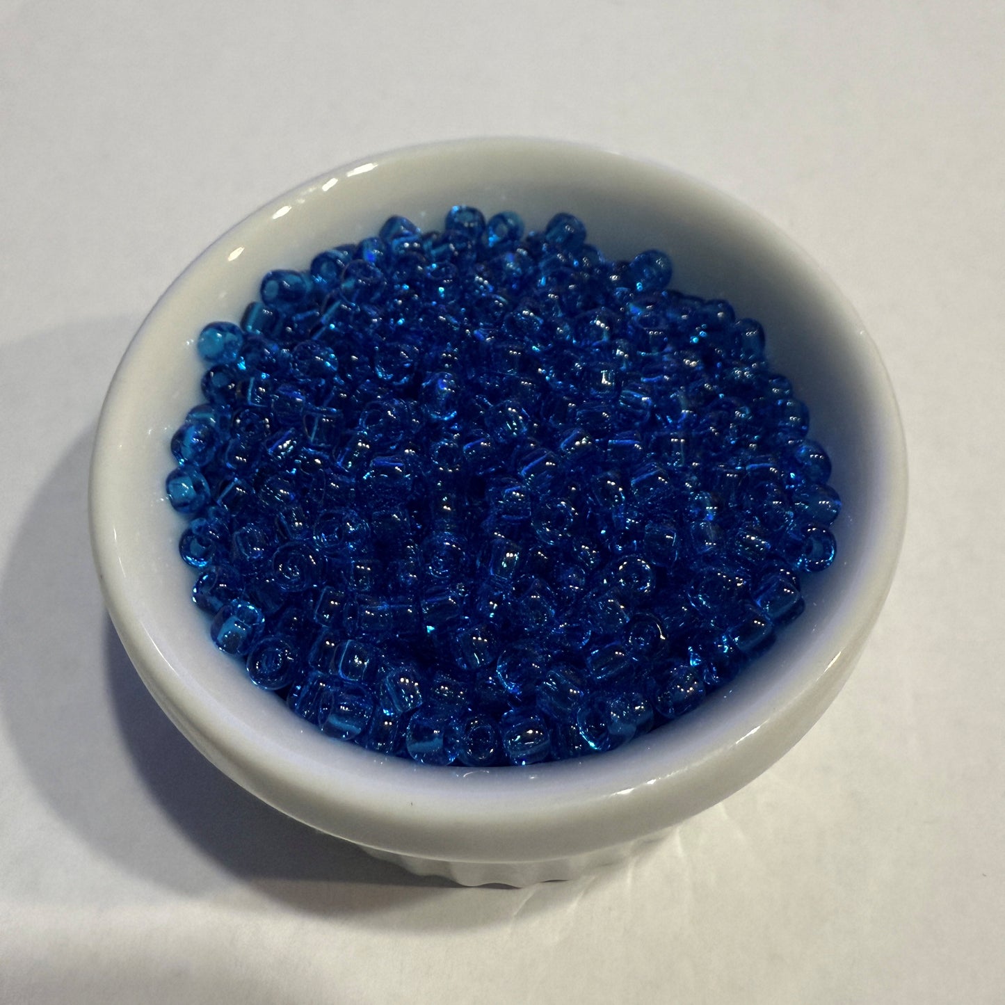 Dyna-Mites™ 8/0 Round Hole Transparent Turquoise Blue 8280SB Seed Beads - 5 or 10 gm