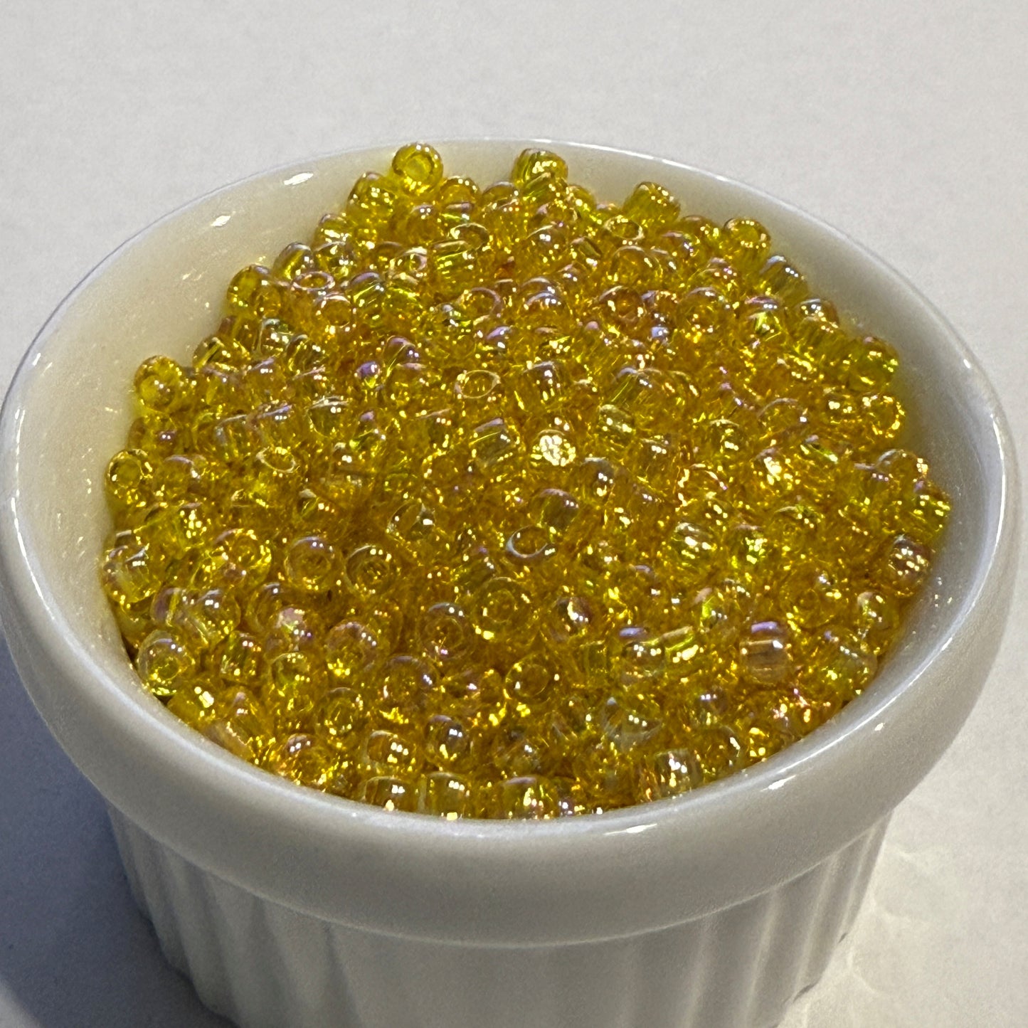 Dyna-Mites™ 8/0 Round Hole Transparent Yellow Rainbow 8212SB Seed Beads - 5 gm