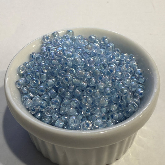Dyna-Mites™ 8/0 Round Hole Transparent Ice Blue Rainbow 8328SB Seed Beads - 5 or 10 gm