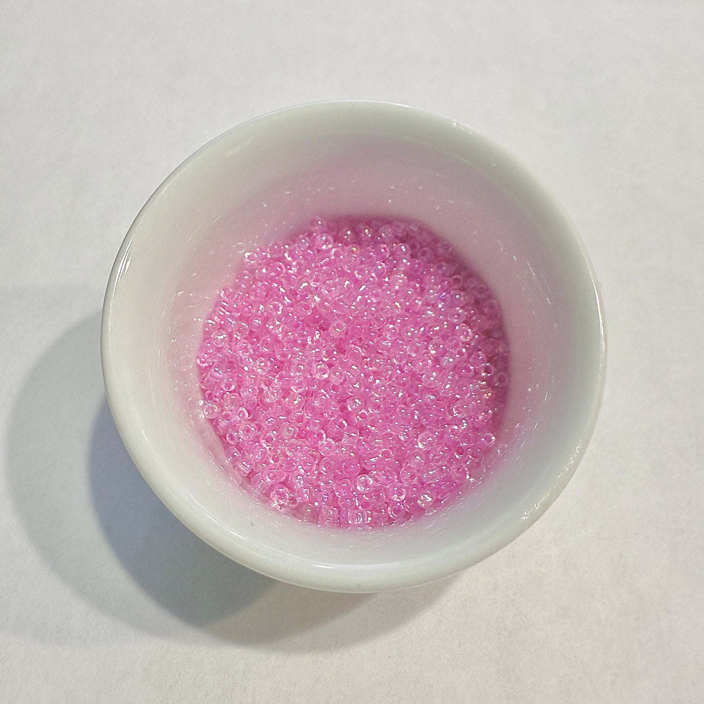 Dyna-Mites™ 11/0 Round Hole Dusty Rose Lined Crystal Rainbow 1856SB Seed Beads - 5 gm