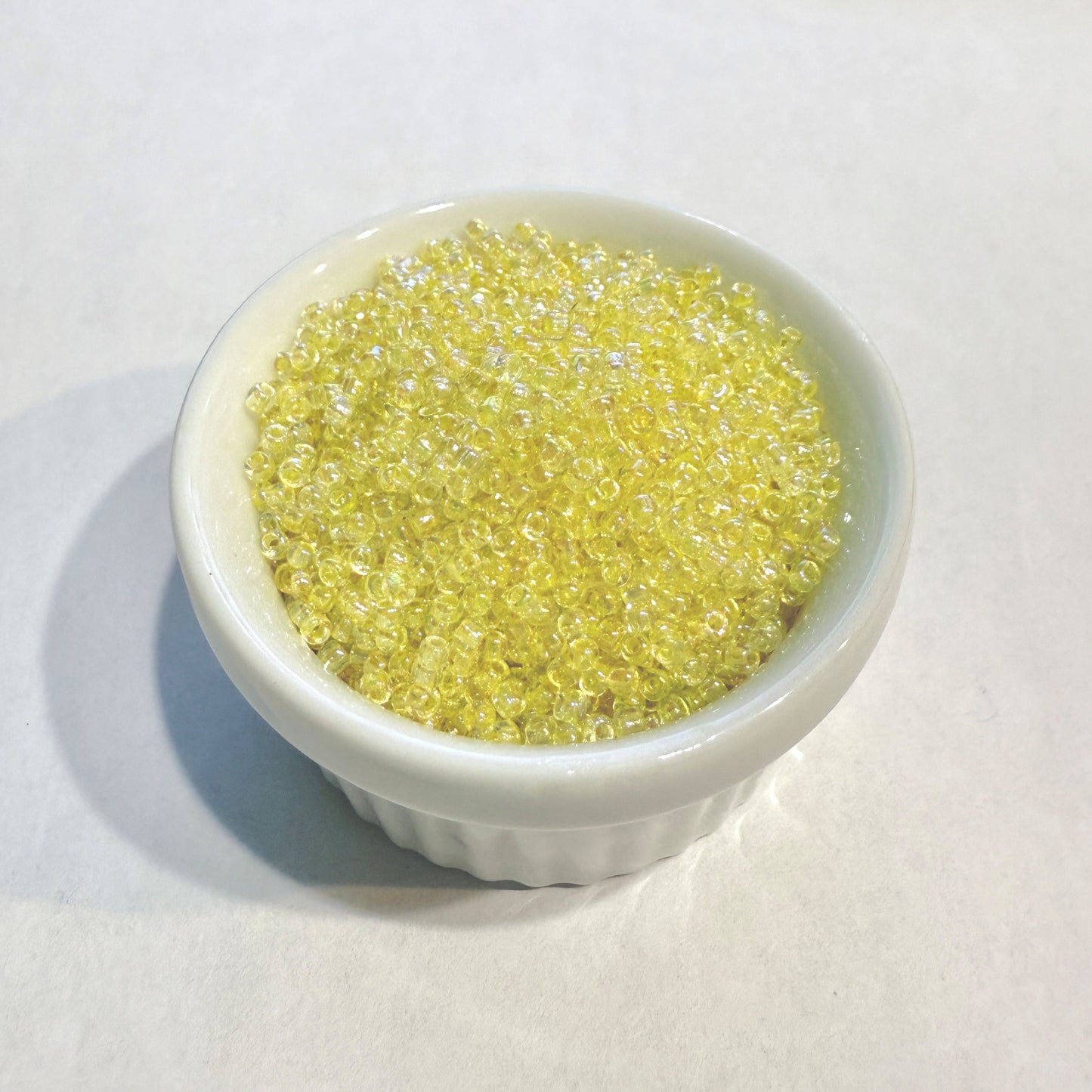 Dyna-Mites™ 11/0 Round Hole Cream Lined Crystal Rainbow 1846SB Seed Beads - 5 gm