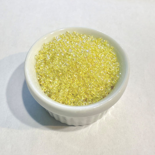 Dyna-Mites™ 11/0 Round Hole Cream Lined Crystal Rainbow 1846SB Seed Beads - 5 gm