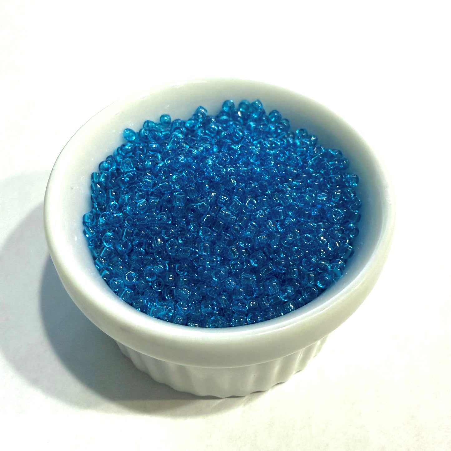 Dyna-Mites™ 11/0 Round Hole Transparent Turquoise Blue 1661SB Seed Beads - 5 gm