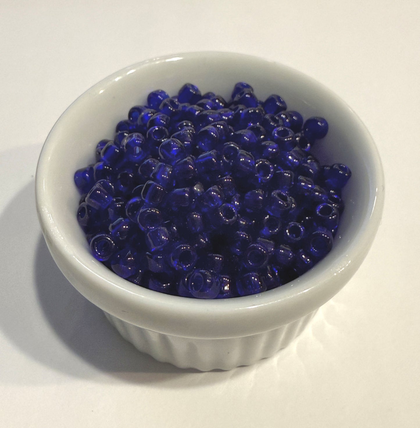 Dyna-Mites™ 6/0 Round Hole Transparent Cobalt Blue 5500SB Seed Beads - 5 or 10 gm
