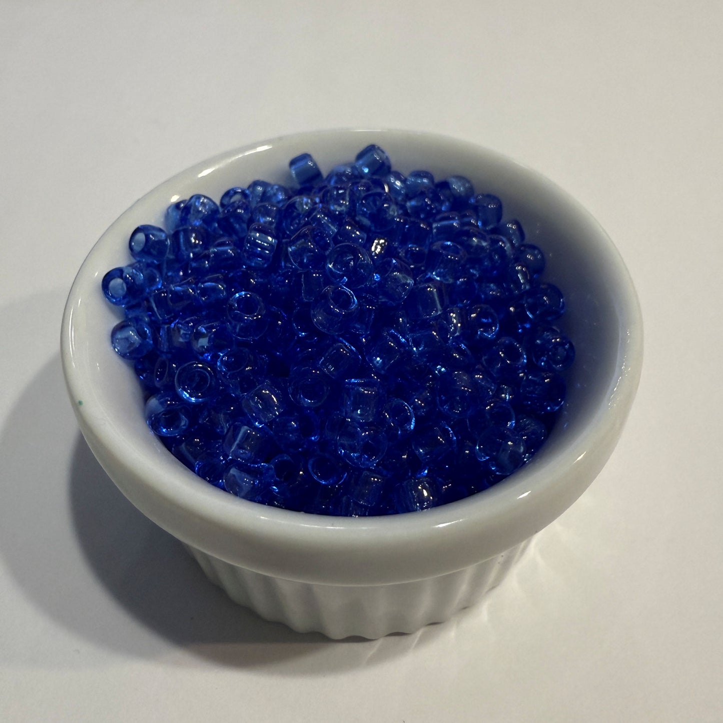 Dyna-Mites™ 6/0 Round Hole Transparent Light Blue 5497SB Seed Beads - 5 or 10 gm