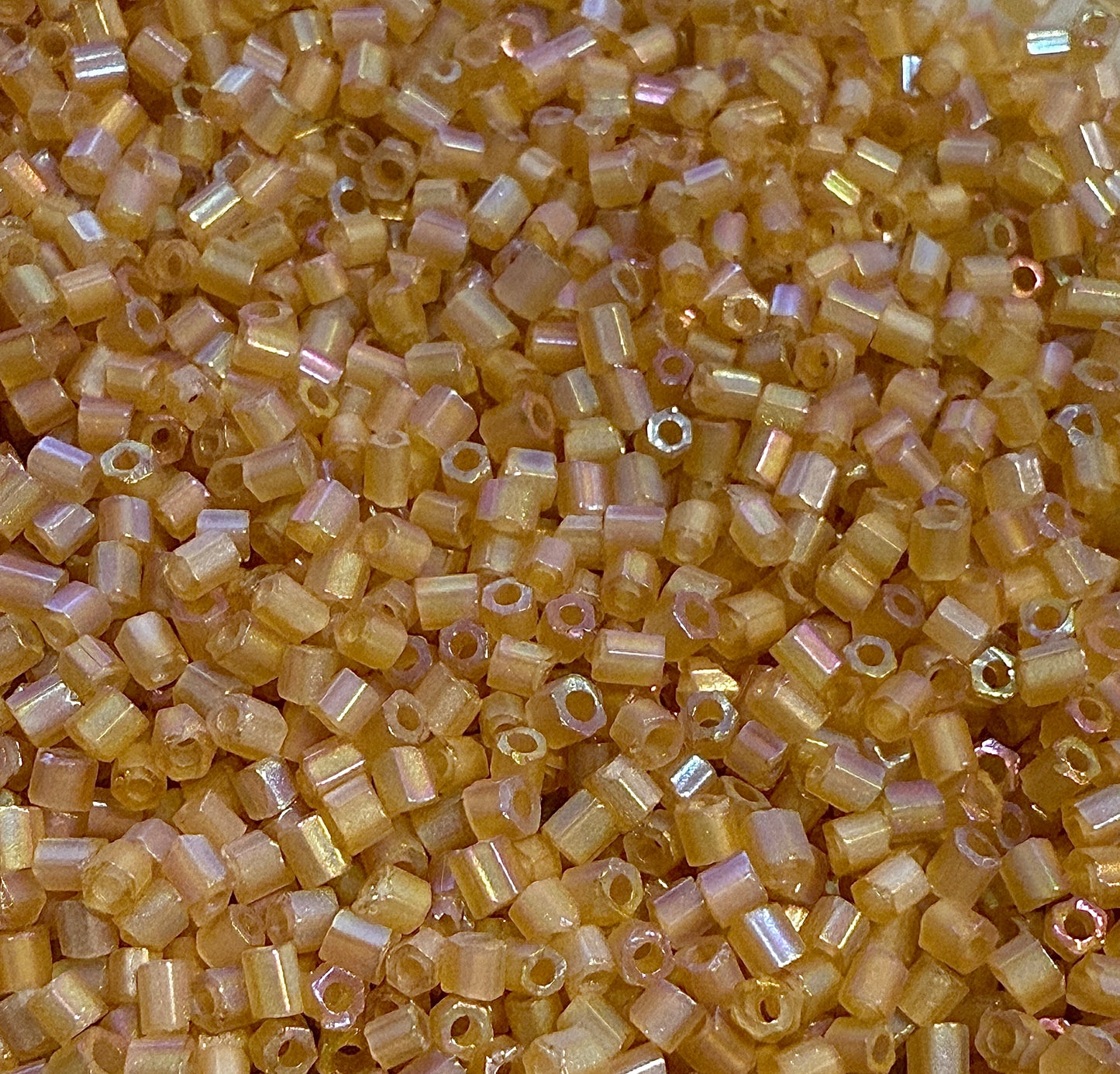 11/0 Two-Cut Hex Matte Transparent Topaz Rainbow Beads - 5 or 10 gm