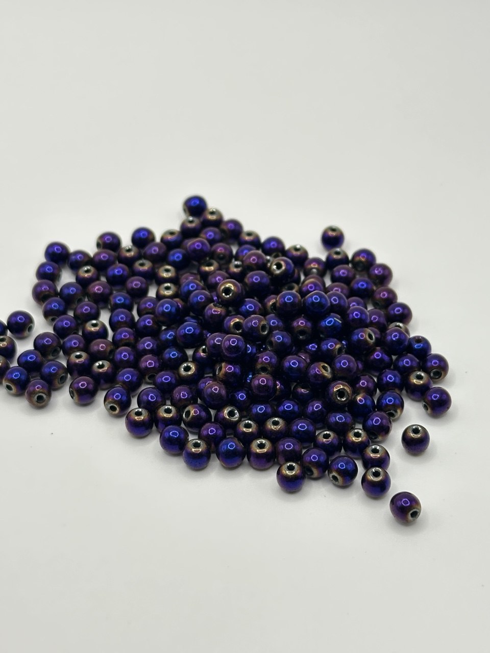 Purple beads on a white background