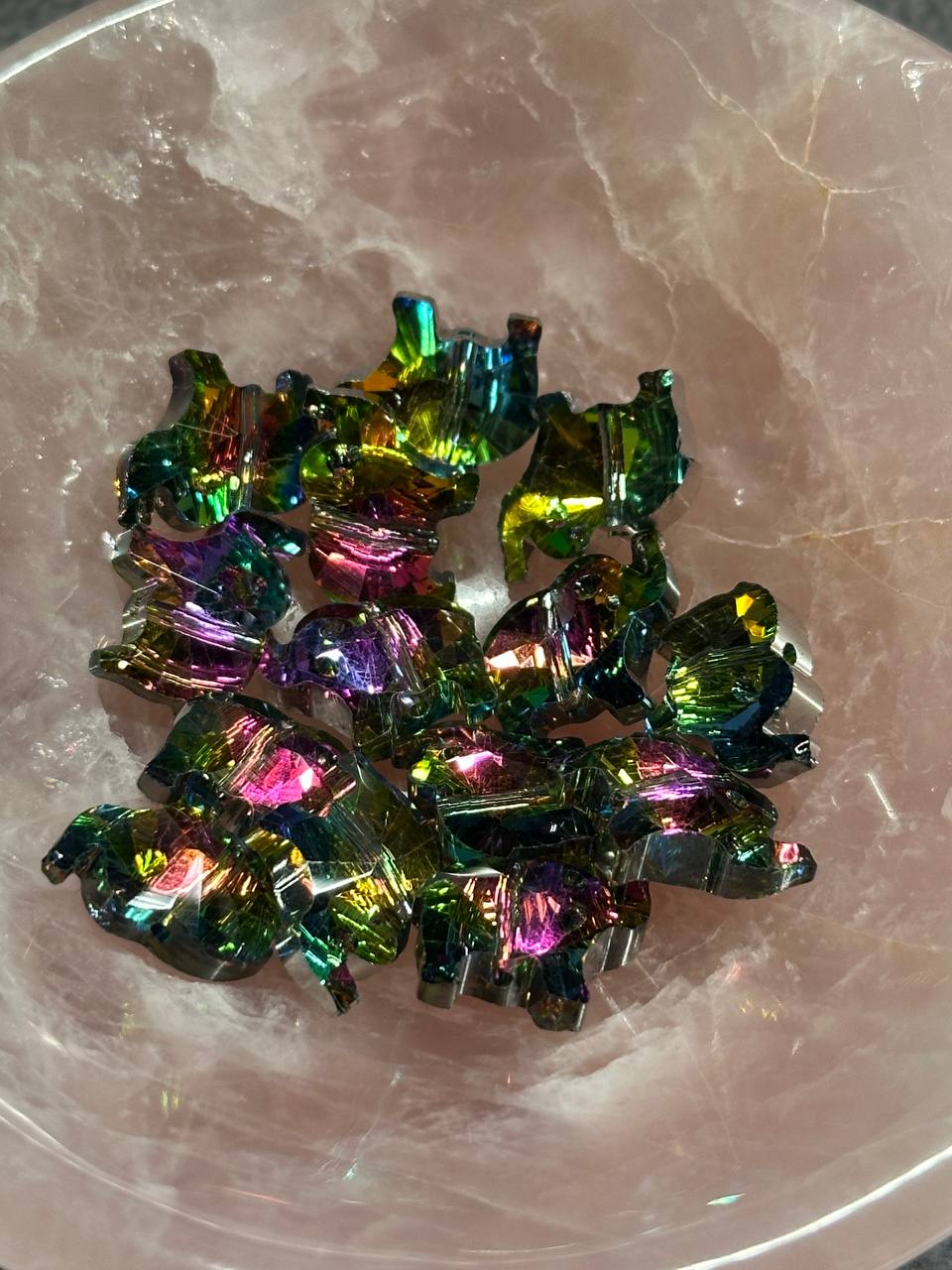 Multicolored crystals on a reflective surface