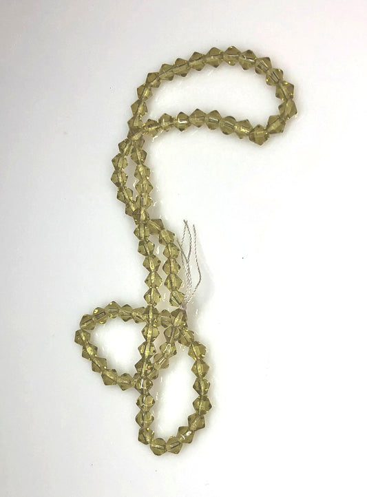 Perles de verre toupies à facettes vert pâle de 4 mm - Fil de 13 pouces