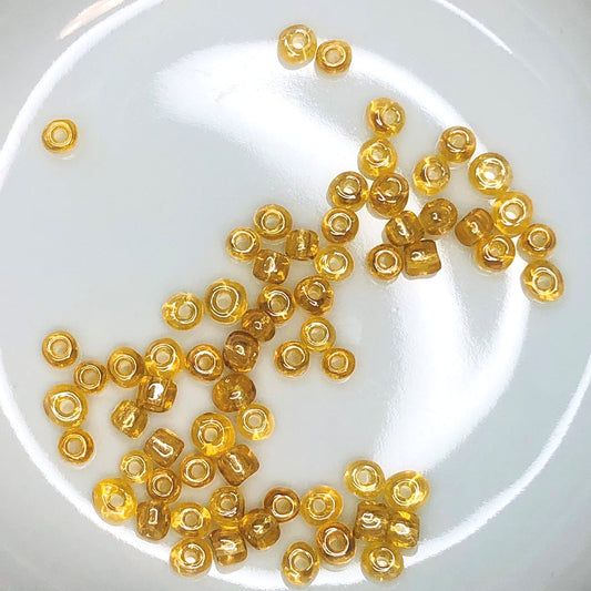 Skleněný rokajl 6/0 Světle hnědý Topaz White Luster, 3,7 nebo 5 g