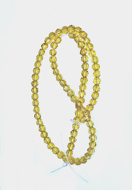 Transparentní světlý topaz / hnědé kulaté skleněné korálky s fazetou, 4 mm – 12palcový pramen