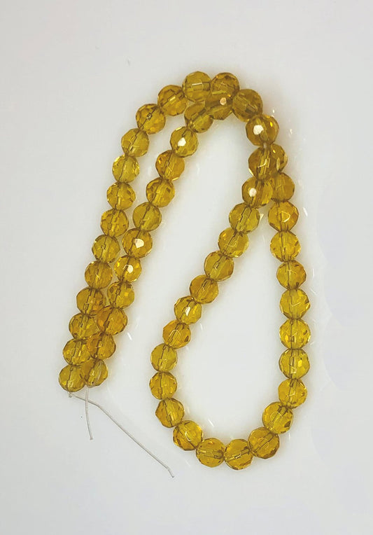 Transparentní světlý topaz / hnědé kulaté skleněné korálky s fazetou, 8 mm – 14palcový pramen