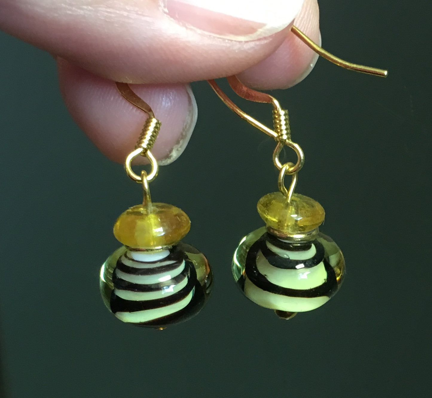 Black Swirls Lampwork and Gold Glass Beaded Dangle Earrings with Gold Plated Ear Wires