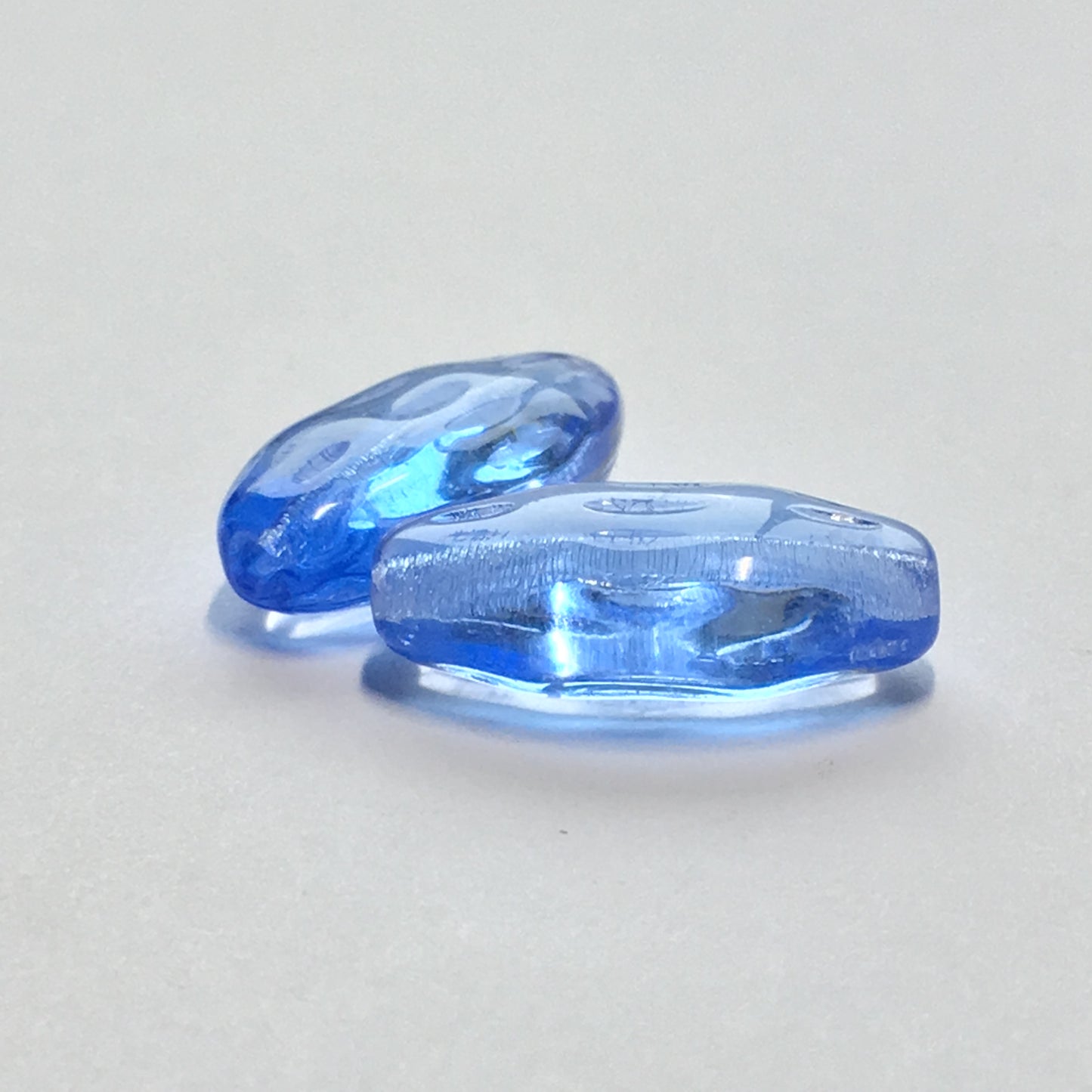 Transparent Blue Dimpled Almond Flat Oval Beads, 20 x 11 x 6 mm - 2 Beads
