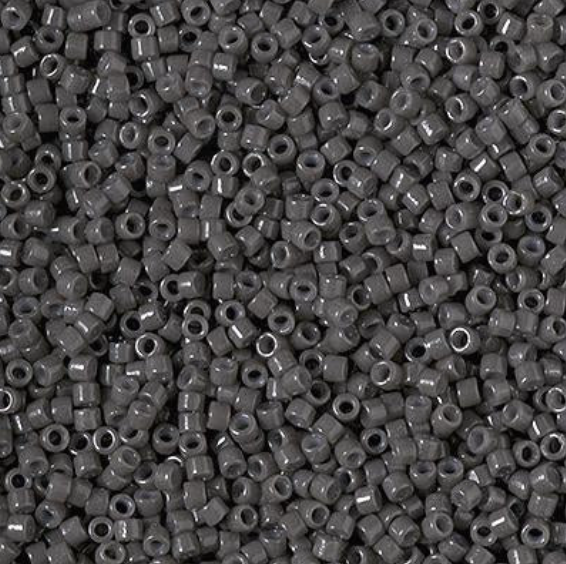 close-up of delica charcoal seed beads