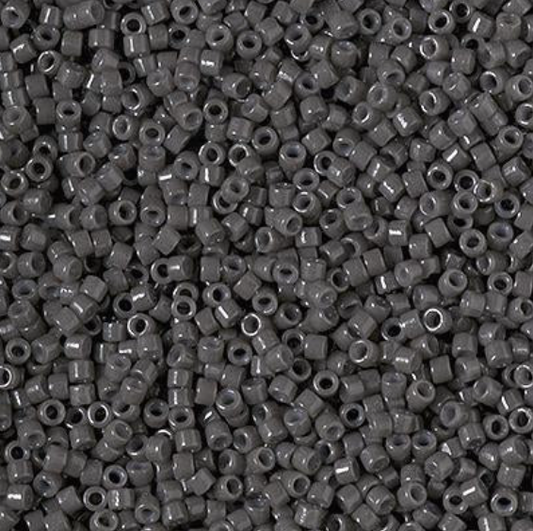 close-up of delica charcoal seed beads