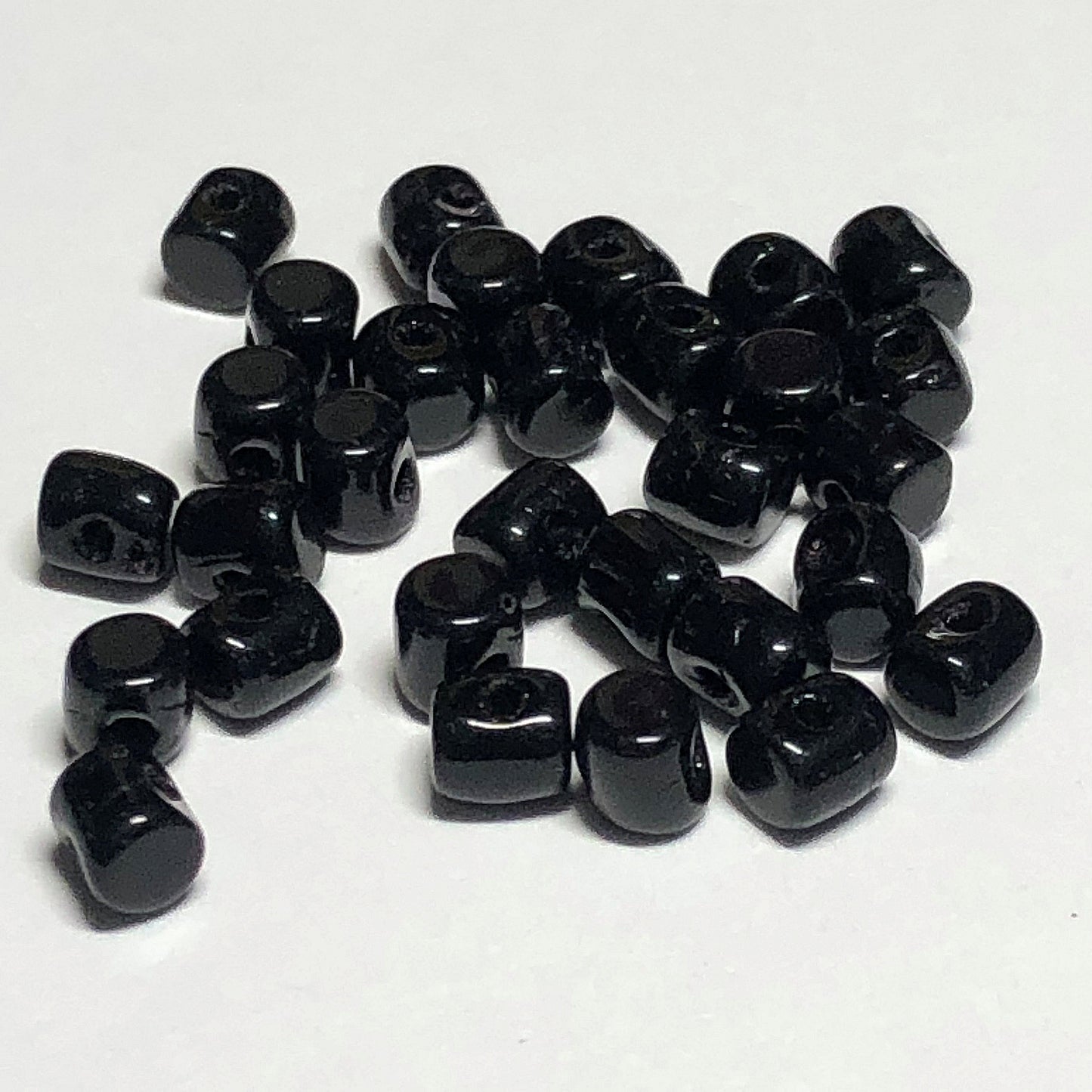 Minos® par Puca® 23980  Jet Black 2.8 x 3 mm Drum Czech Glass Beads - 5 Grams