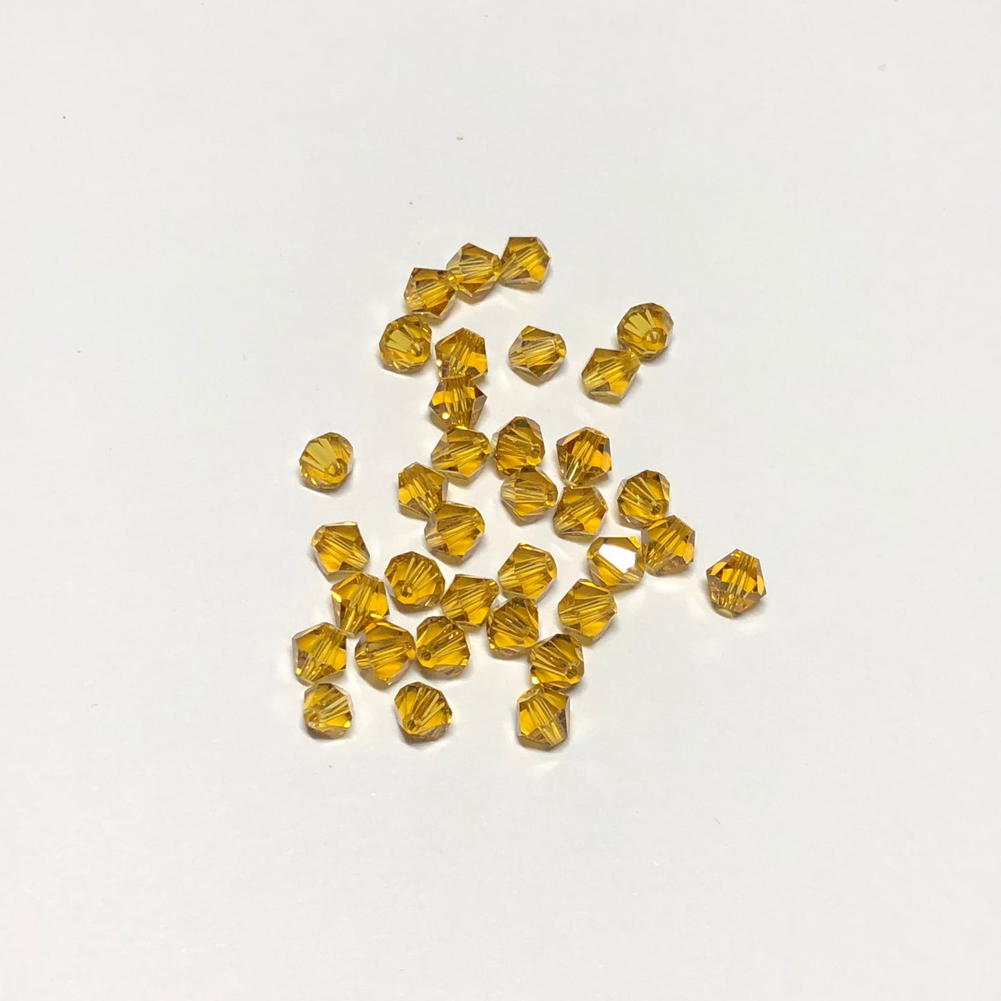 Swarovski Crystal Amber Faceted Bicone Beads, 4 mm, 34 Beads