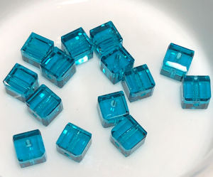 Crystal Passions 4 mm 5601 Blue Zircon Faceted Cube / Square Beads - 14 Beads