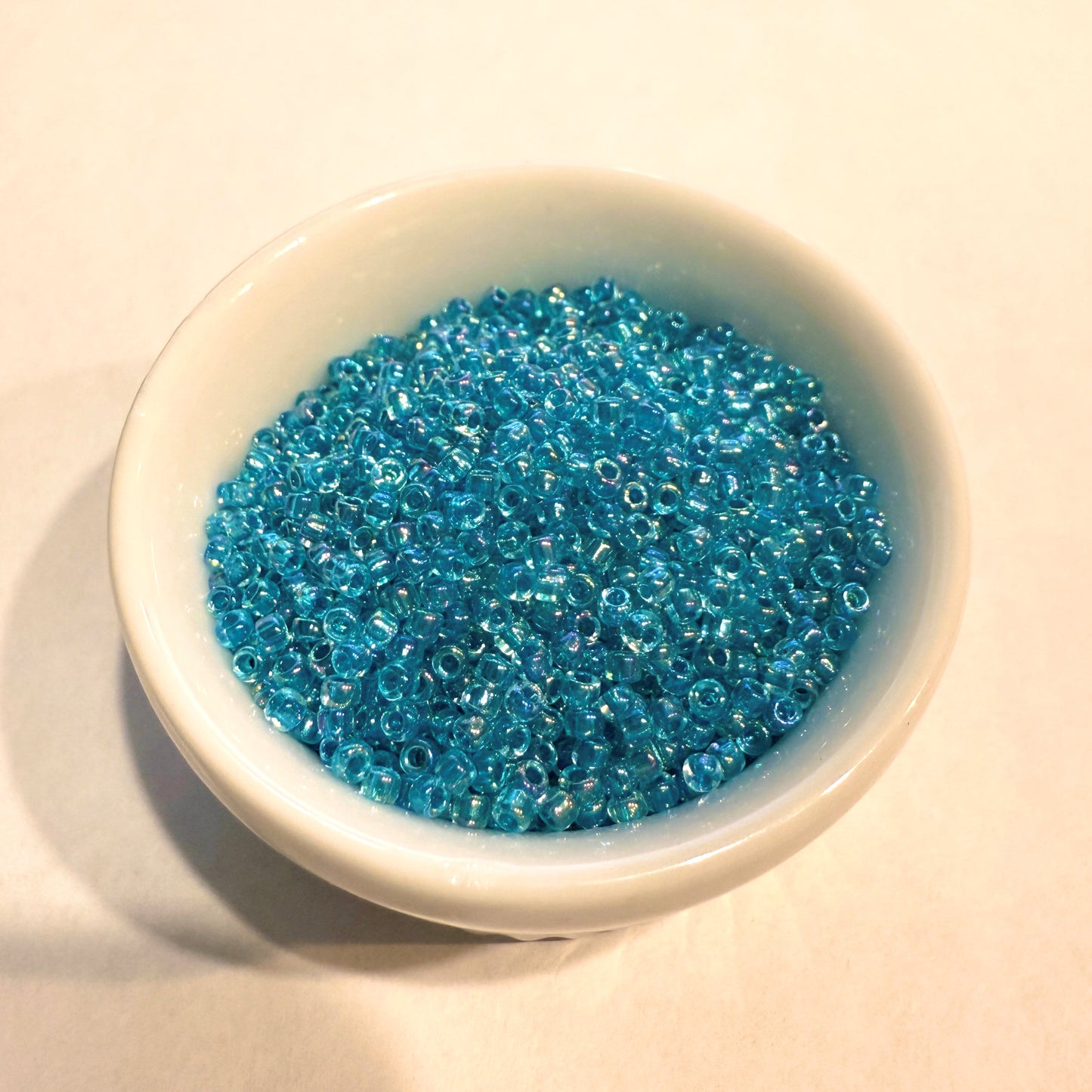 Dyna-Mites™ 11/0 Round Hole Teal Blue Lined Crystal Rainbow 1872SB Seed Beads - 5 gm