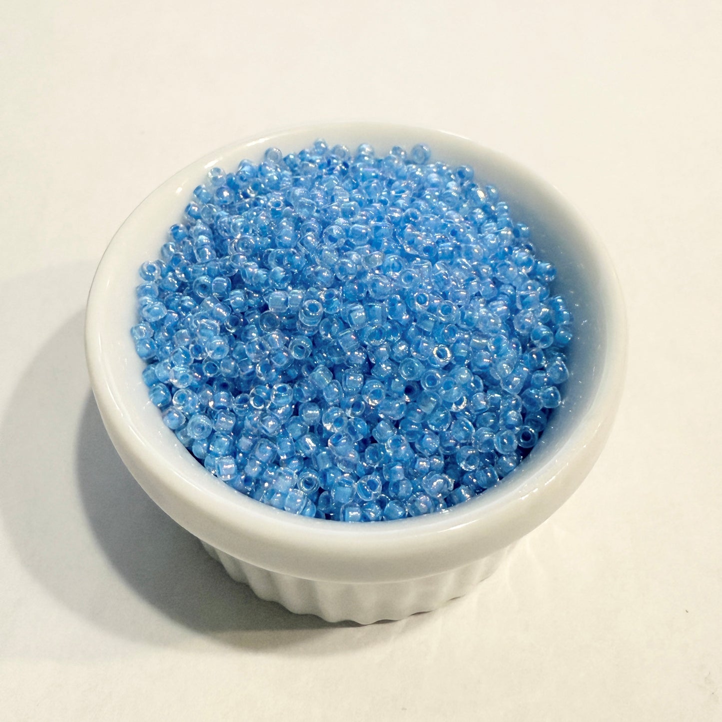 Dyna-Mites™ 11/0 Round Hole Aqua Blue Lined Crystal Rainbow 1864SB Seed Beads - 5 gm