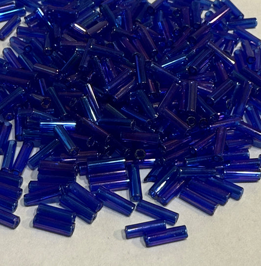 Preciosa #3 - 6-7 mm 61300 Transparent Medium Blue Rainbow Glass Bugle Beads - 5 gm