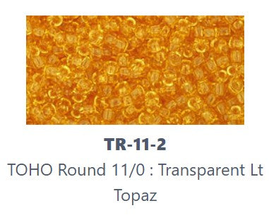 TOHO TR-11-2  11/0 Transparent Very Light Topaz Seed Beads -  5 gm