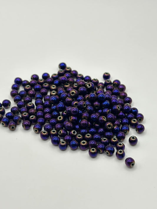 Purple beads on a white background