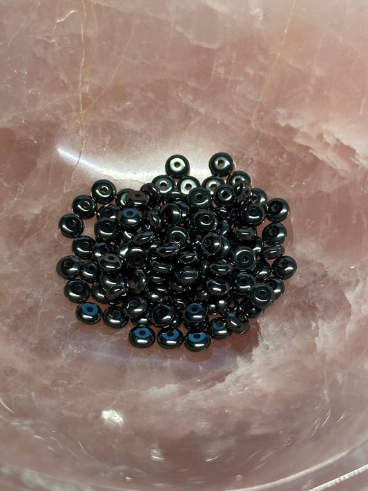 black hemalyke roundel beads