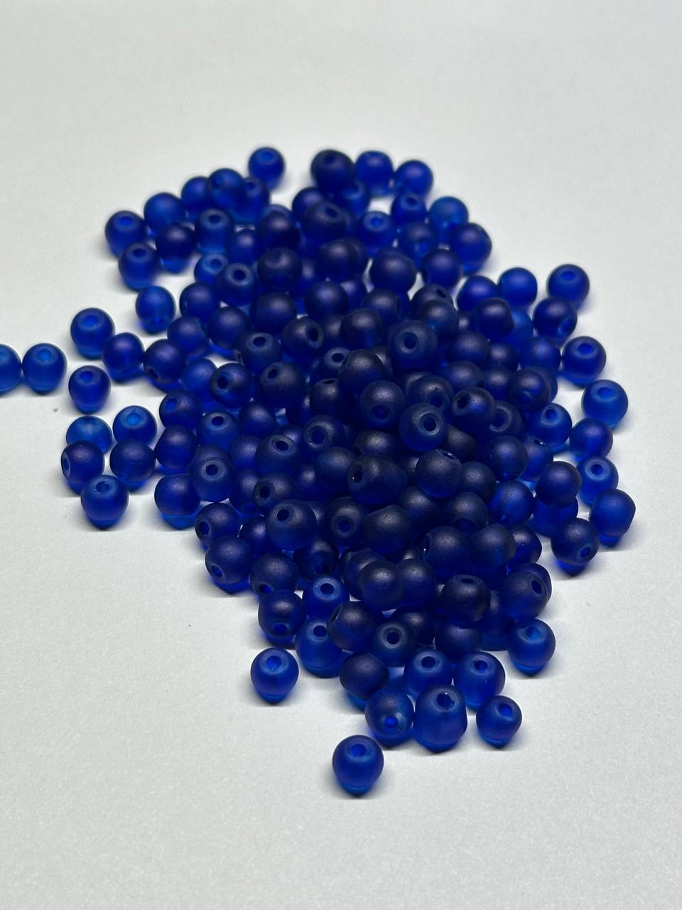 Blue beads on a white background