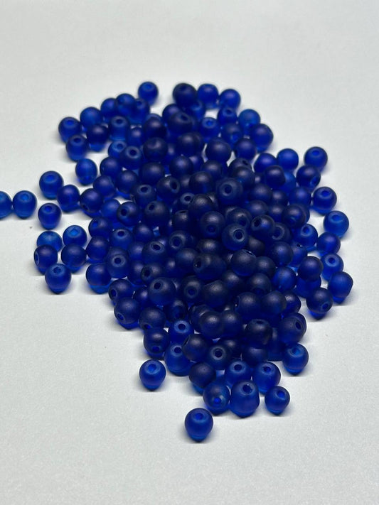 Blue beads on a white background
