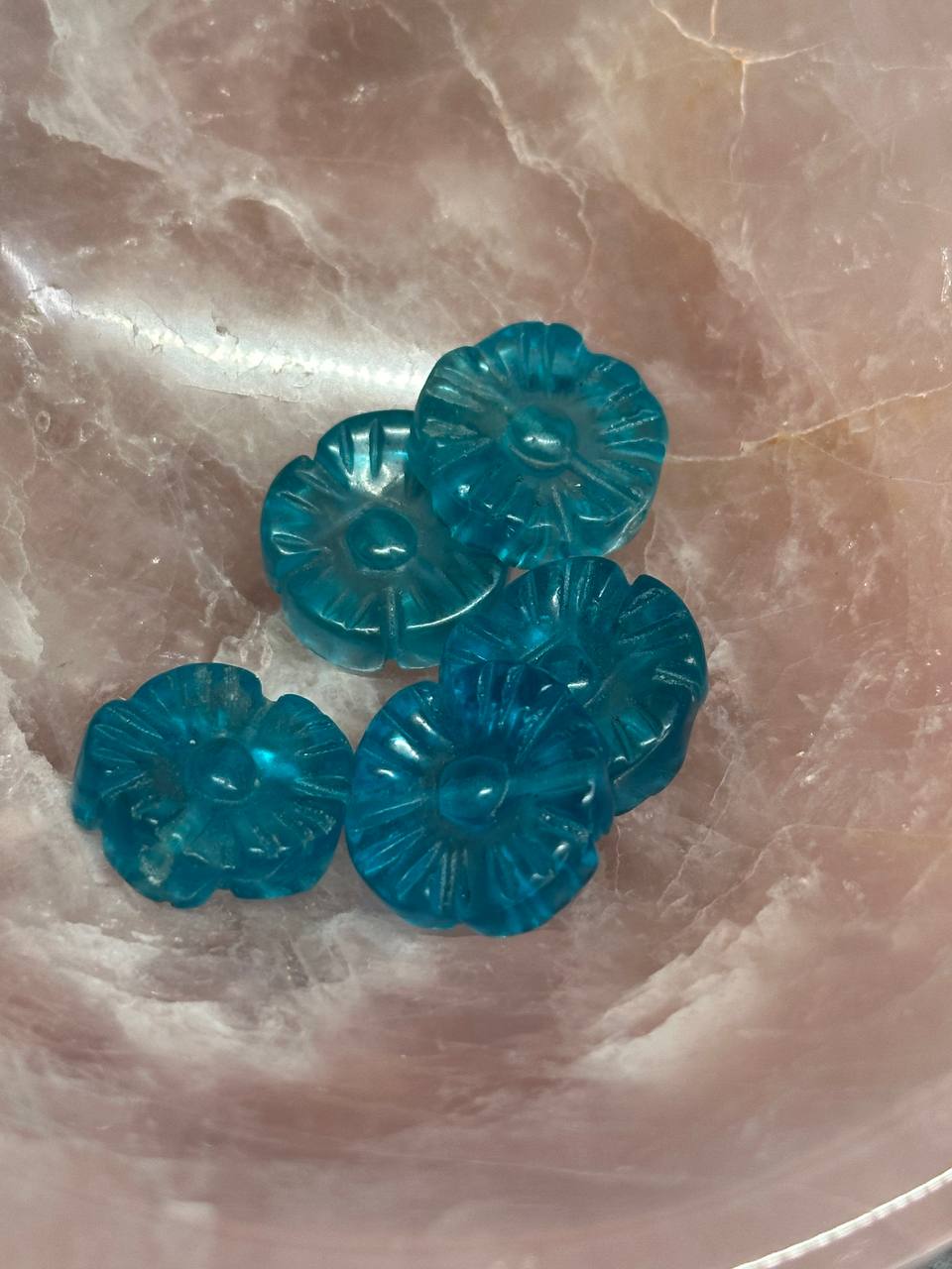 Blue decorative items on a marble surface