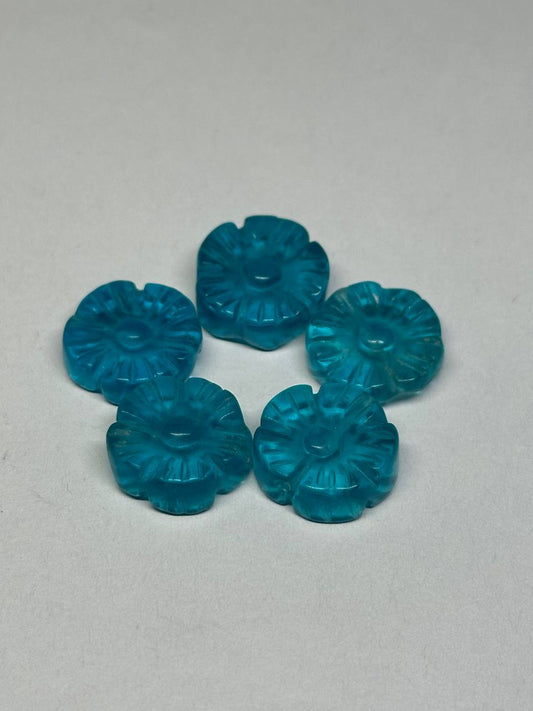 Set of blue decorative items on a gray background