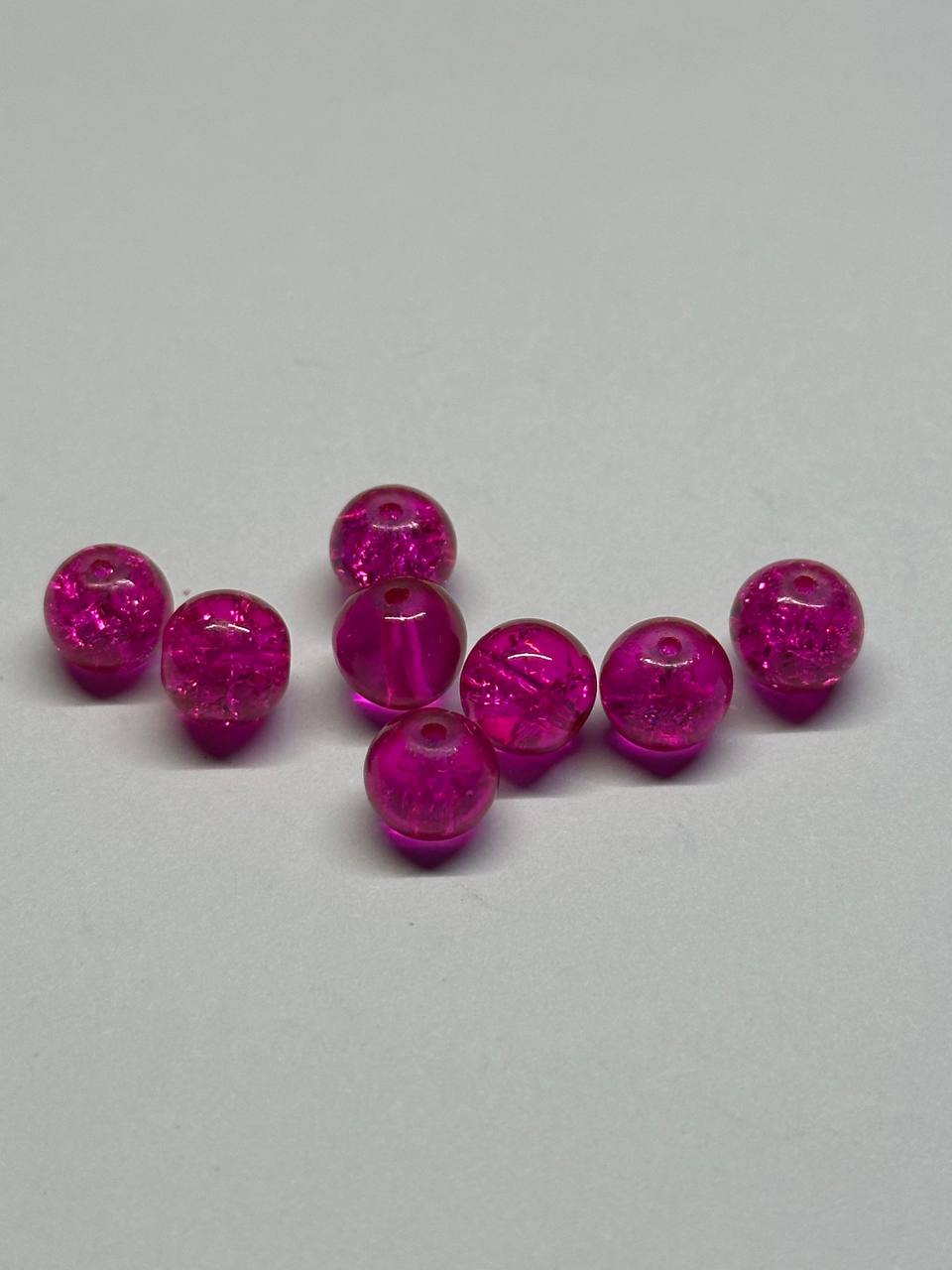 Pink beads on a gray background