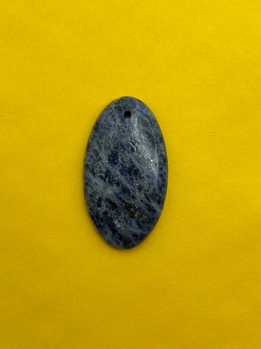 Blue oval stone pendant on a yellow background