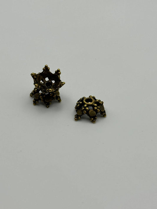 Intricate antique copper bead caps
