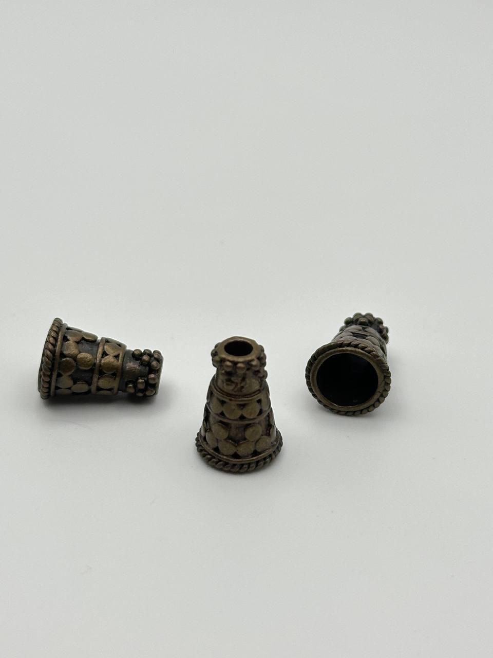 antique copper connector cones