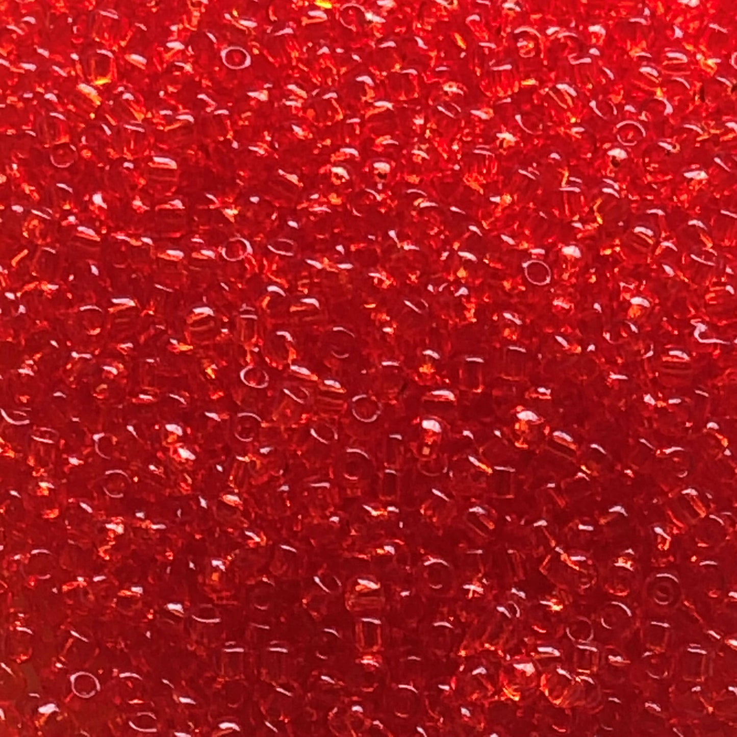 TOHO TR-11-5   11/0 Transparent Ruby Hyacinth Seed Beads,  5 or 10 gm