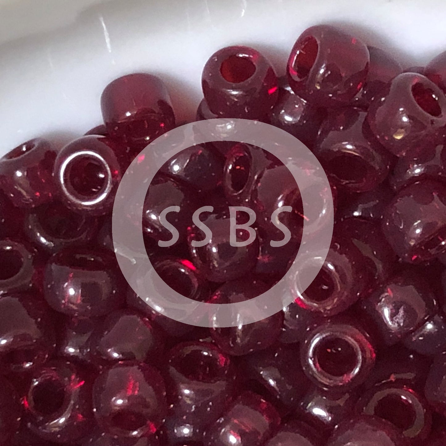 TOHO TR-6-5D  6/0 Transparent Garnet Seed Beads, 5 or 10 gm