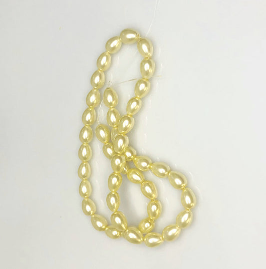 Light Yellow Teardrop Glass Pearl Beads, 9 x 7 mm - 15-Inch Strand