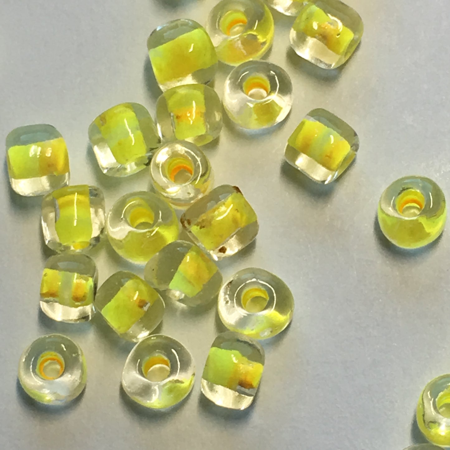 TOHO TR-6-349  6/0 Color Lined Yellow Clear Seed Beads, 5 or 10 gm