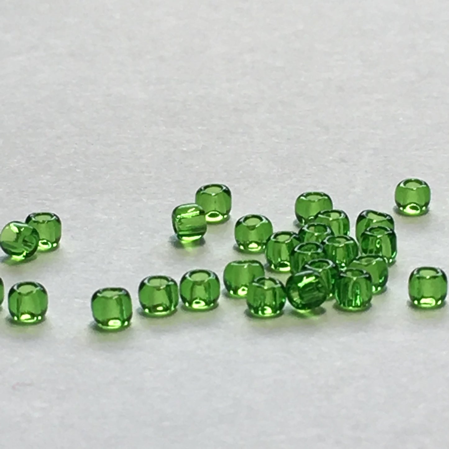 TOHO TR-11-7  11/0 Transparent Peridot Seed Beads, 5 gm