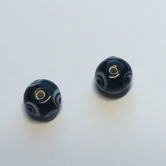 Black Glass Lampwork Beads with White Eyes, 7 x 9 mm - 2 Beads