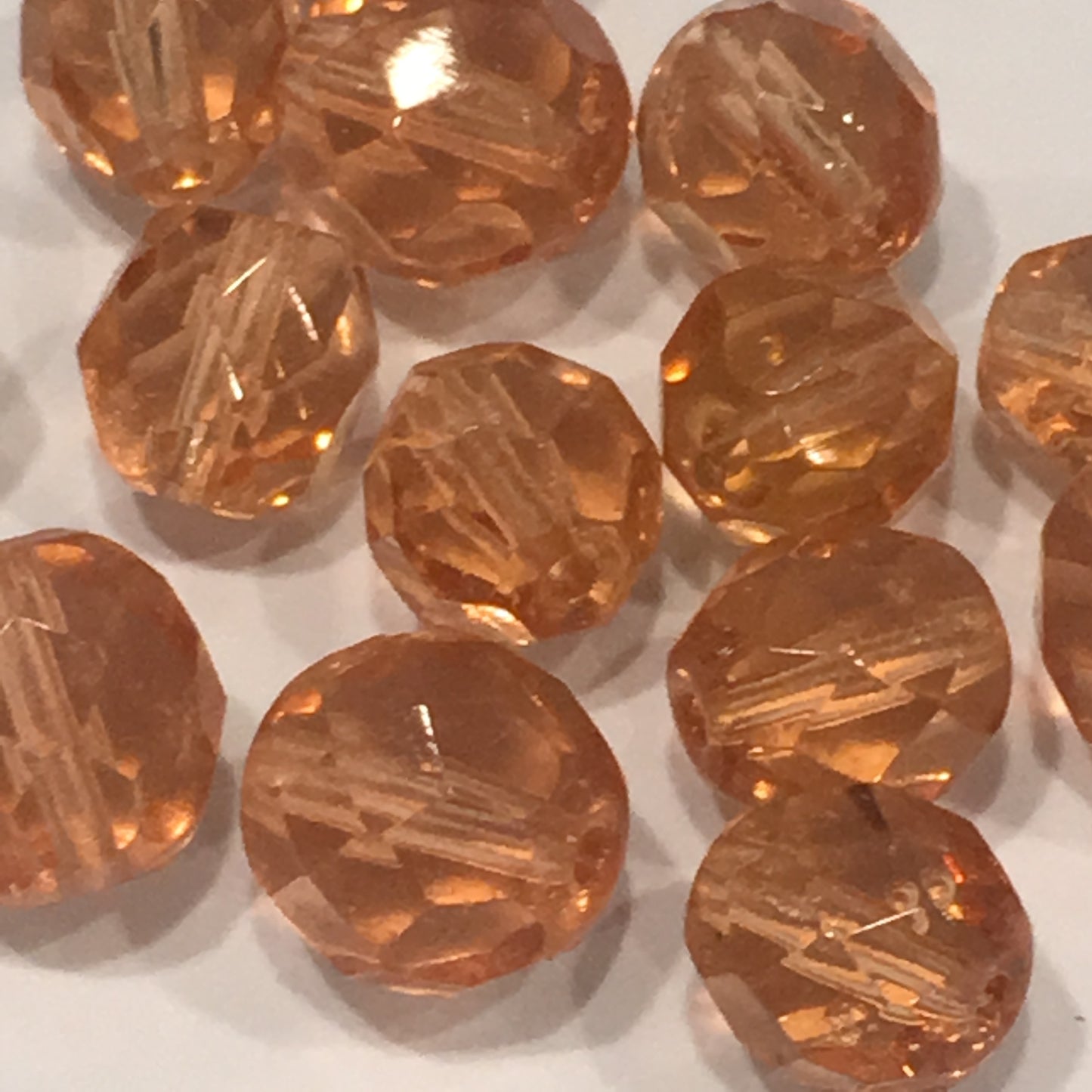 Transparent Light Orange Glass Faceted Round Beads, 7 mm (10) and 9 mm (5)