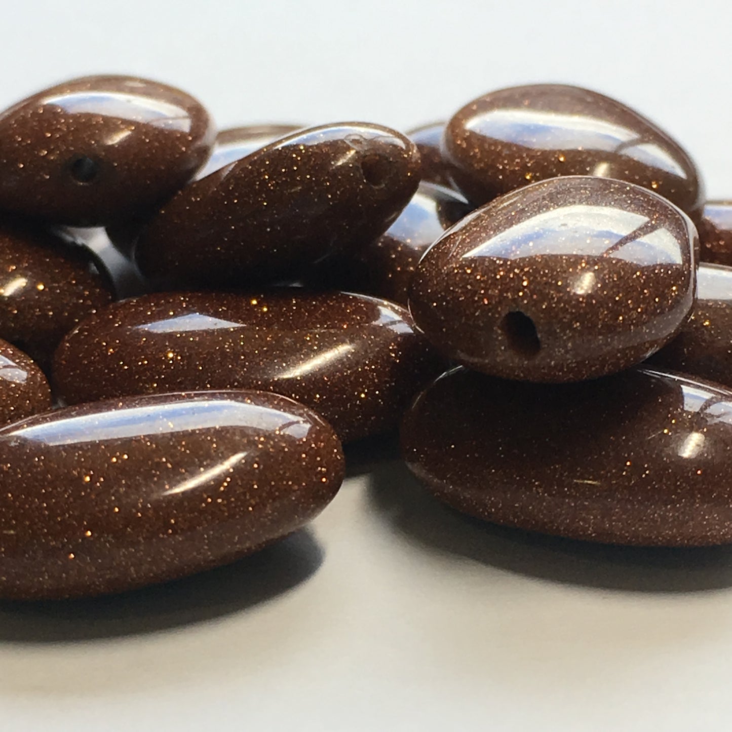Goldstone Semi-Precious Oval Flat Beads, 18 x 13 x 7 mm, 20 Beads