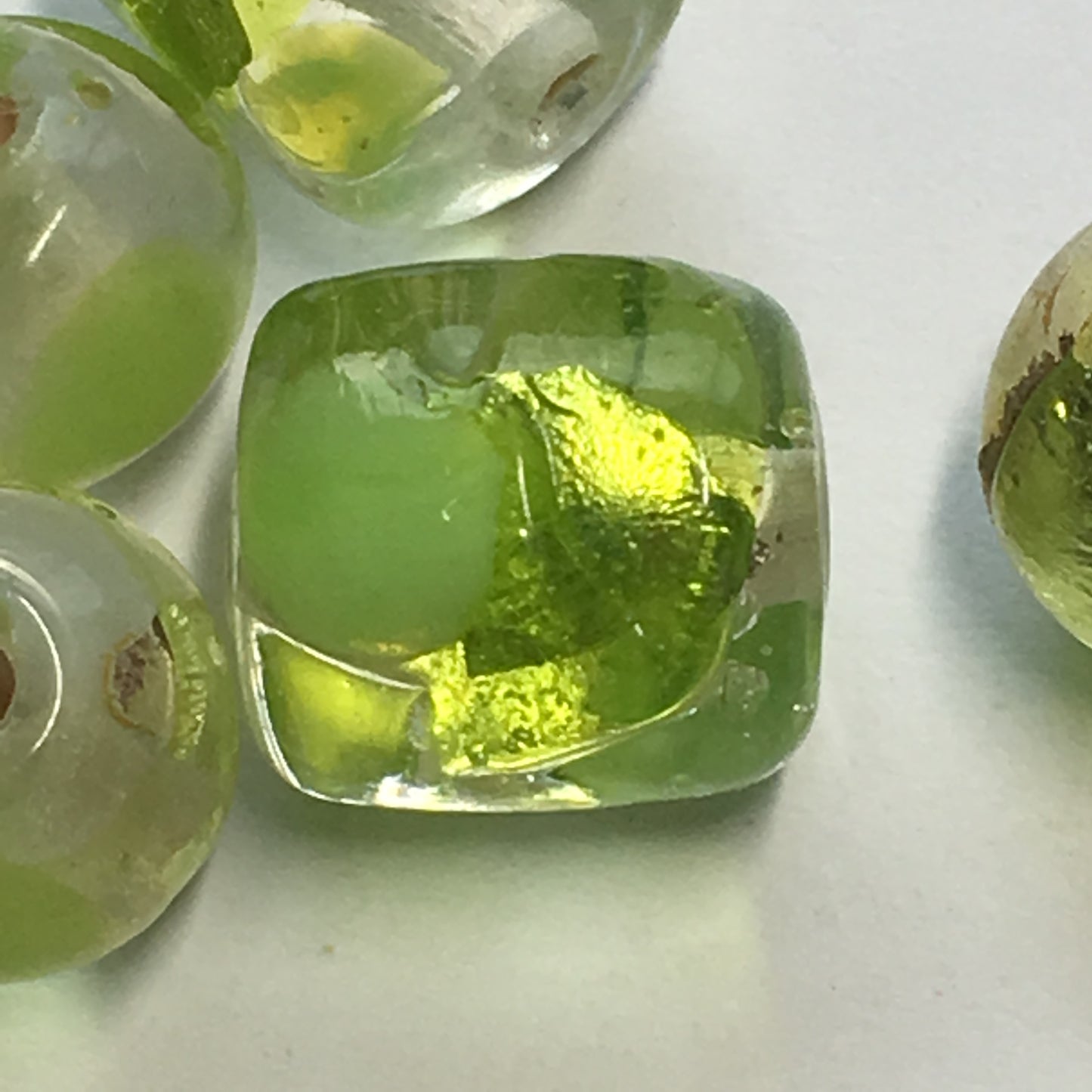 Clear Glass Round and Barrel Beads with Green Foil Patches, 8 mm & 11 x 10 mm, 14 Beads