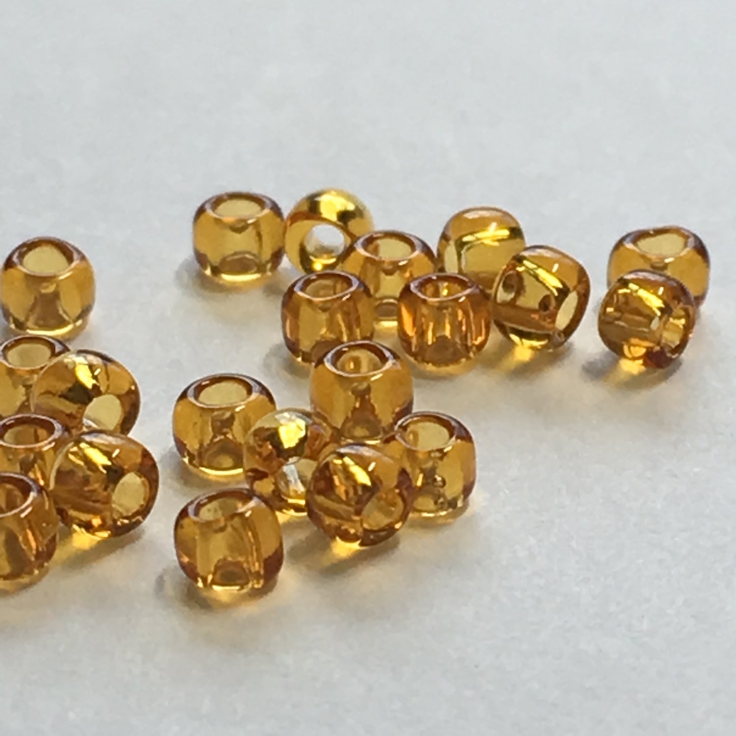 TOHO TR-11-2C  11/0 Transparent Dark Topaz Seed Beads, 5 gm
