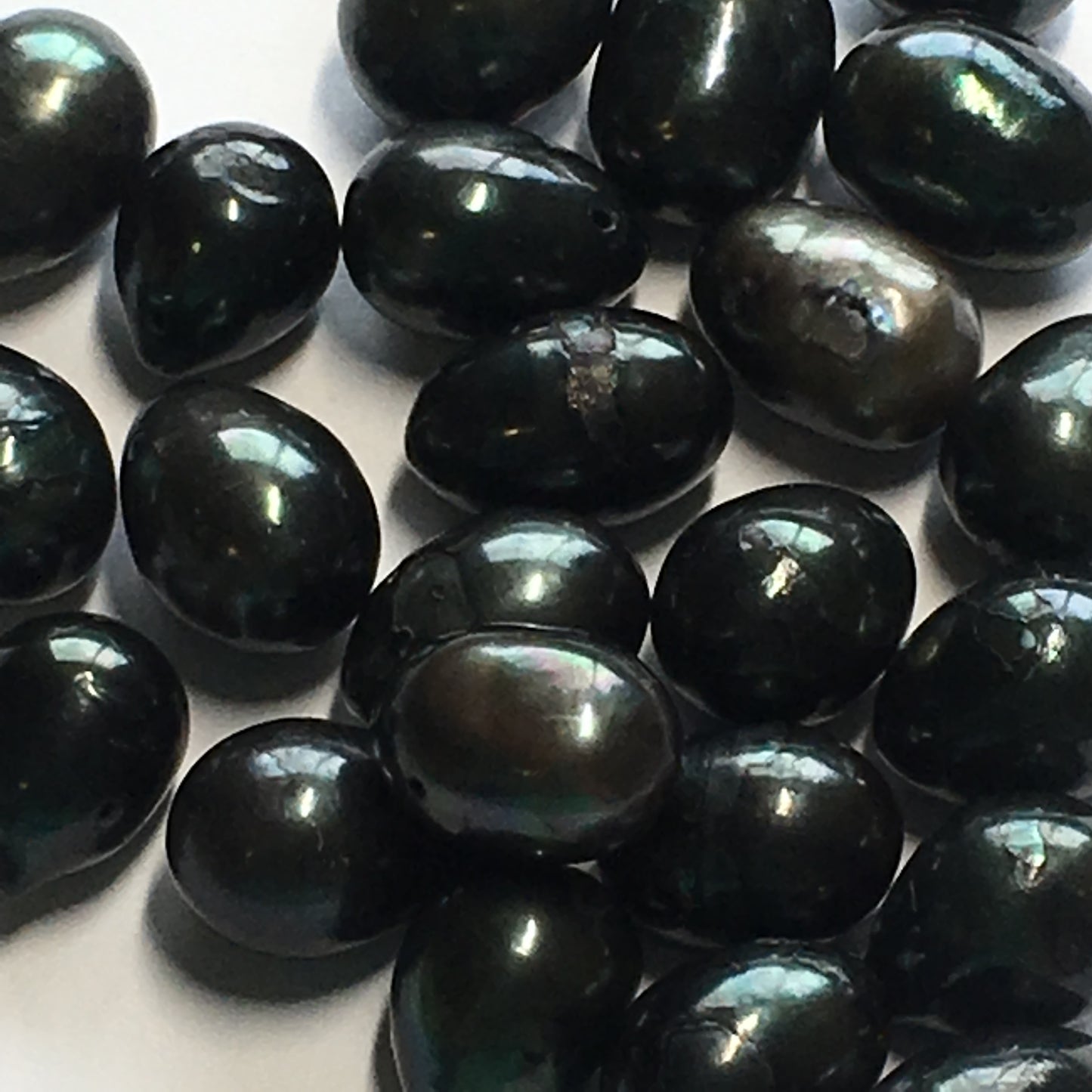 Dark Metallic Blue Egg Pearls, Avg. Size 13 x 10 mm, 25 Pearls